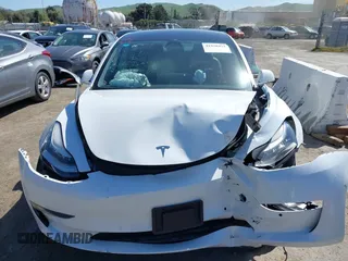 2020 Tesla Model 3 Long Range with VIN 5YJ3E1EB4LF619754, listed as a IAAI auction lot 41920422 with 82,430 mi miles and . Bid and sale history available at DreamBid. Image 11.