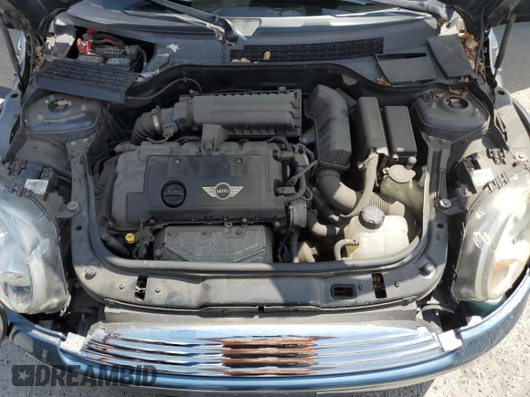 2009 MINI Convertible с VIN WMWMR33589TU96481, выставлен на аукционе Copart как лот 52785515 с пробегом 144 792 миль миль и Чистый • Clean title. История ставок и продаж доступна на DreamBid. Изображение 11.