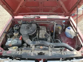 1997 Nissan Frontier XE with VIN 1N6SD11S5VC403526, listed as a Copart auction lot 58222295 with 127,211 mi miles and Clean title. Bid and sale history available at DreamBid. Image 11.