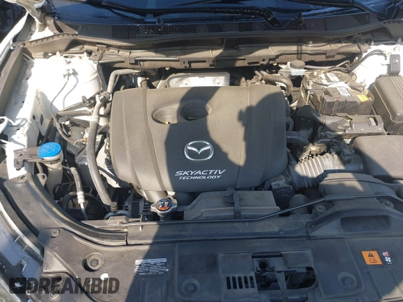 2014 Mazda CX-5 Grand Touring with VIN JM3KE2DY1E0424890, listed as a IAAI auction lot 42052437 with 107,793 mi miles. Bid and sale history available at carsss.com. Image 10.