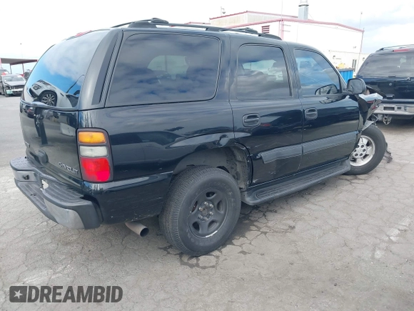 2005 Chevrolet Tahoe Z71 with VIN 1GNEC13TX5R145310, listed as a IAAI auction lot 42056793 with 159,002 mi miles and . Bid and sale history available at DreamBid. Image 4.