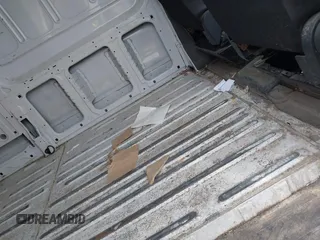 2023 Ford Transit Cargo with VIN 1FTBR3X86PKA69978, listed as a IAAI auction lot 41815672 with 60,590 mi miles and . Bid and sale history available at DreamBid. Image 8.