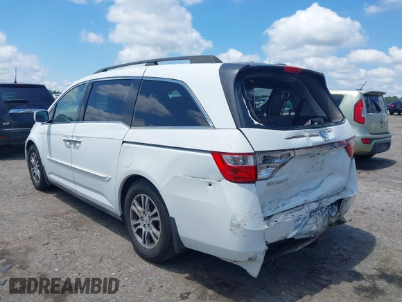 2011 Honda Odyssey EX-L with VIN 5FNRL5H6XBB002461, listed as a IAAI auction lot 42662720 with 145,672 mi miles and . Bid and sale history available at DreamBid. Image 3.