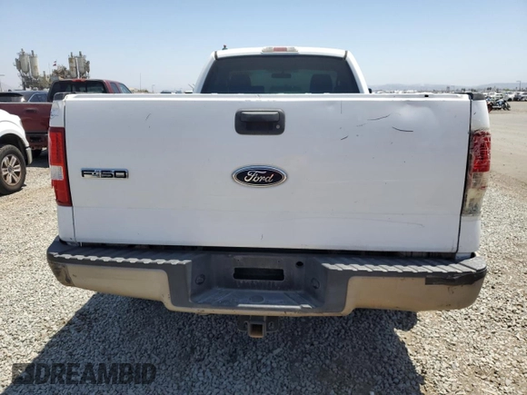 2005 Ford F-150 XL with VIN 1FTRF12255NB53669, listed as a Copart auction lot 61636135 with 156,562 mi miles and Salvage title. Bid and sale history available at DreamBid. Image 6.