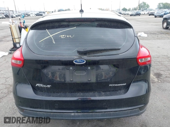 2017 Ford Focus Titanium with VIN 1FADP3N2XHL230766, listed as a IAAI auction lot 42386275 with 64,138 mi miles and . Bid and sale history available at DreamBid. Image 16.