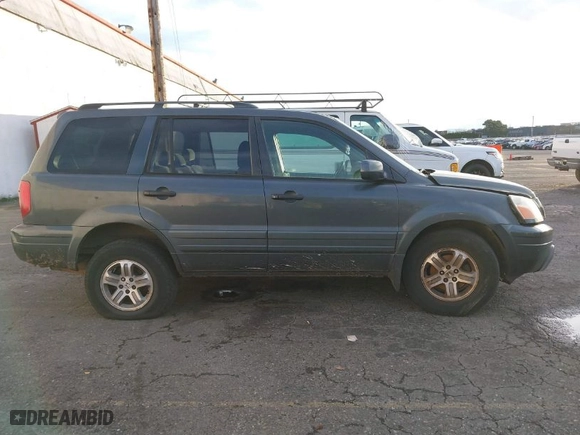 2005 Honda Pilot EX with VIN 2HKYF18455H565742, listed as a IAAI auction lot 41264177 with 304,396 mi miles. Bid and sale history available at carsss.com. Image 13.