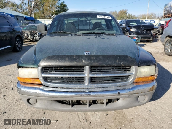 2000 Dodge Dakota z VIN 1B7FL26X5YS793314, wystawiony jako Copart lot #79477744 z przebiegiem 358 319 mil mil oraz Szkoda całkowita • Salvage title. Historia ofert i sprzedaży dostępna na DreamBid. Obrazek 5.