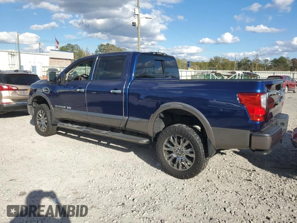 2016 Nissan Titan XD Platinum Reserve with VIN 1N6BA1F46GN512586, listed as a Copart auction lot 82406194 with 115,666 mi miles and Salvage Title. Bid and sale history available at carsss.com. Image 3.