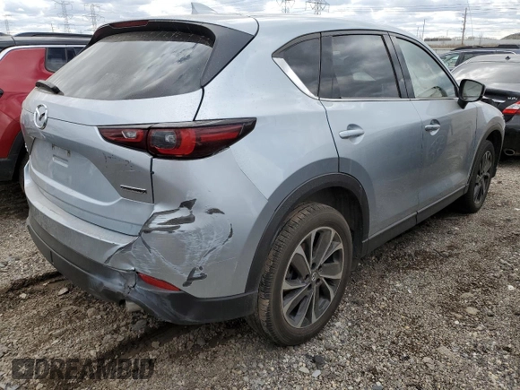 2023 Mazda CX-5 S Premium with VIN JM3KFBDM8P0203834, listed as a Copart auction lot 52496815 with 54,306 mi miles and Non Repairable. Bid and sale history available at DreamBid. Image 3.