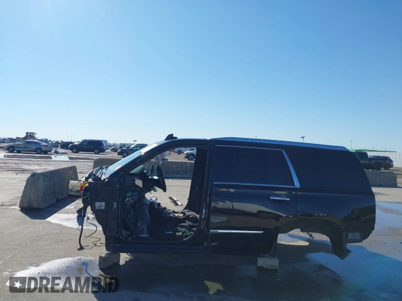 2015 Cadillac Escalade Premium z VIN 1GYS3NKJ5FR655370, wystawiony jako IAAI lot #41764570 z przebiegiem Nie podano mil oraz . Historia ofert i sprzedaży dostępna na DreamBid. Obrazek 15.