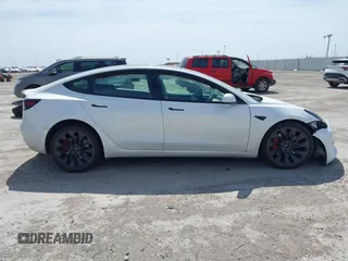 2021 Tesla Model 3 Performance with VIN 5YJ3E1EC8MF044388, listed as a IAAI auction lot 41821892 with Not Provided miles and . Bid and sale history available at carsss.com. Image 12.