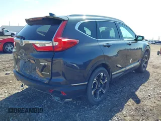 2018 Honda CR-V Touring with VIN 7FARW2H94JE044336, listed as a IAAI auction lot 41934128 with 70,861 mi miles. Bid and sale history available at carsss.com. Image 4.