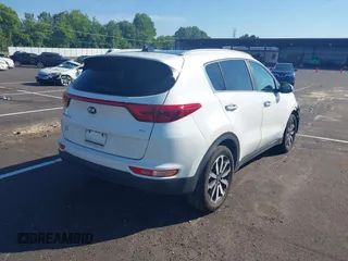2017 Kia Sportage EX with VIN KNDPN3AC9H7077804, listed as a IAAI auction lot 42632194 with 134,027 mi miles and . Bid and sale history available at DreamBid. Image 4.