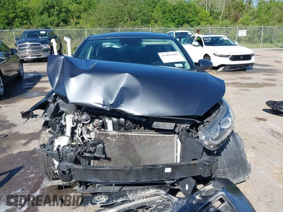 2021 Kia Forte LXS with VIN 3KPF24AD5ME309702, listed as a IAAI auction lot 41992202 with 69,531 mi miles and . Bid and sale history available at DreamBid. Image 12.