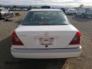1995 Mercedes-Benz C with VIN WDBHA28E1SF151911, listed as a Copart auction lot 76814424 with 128,184 mi miles and Clean Title. Bid and sale history available at carsss.com. Image 6.