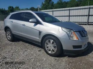 2014 Cadillac SRX Luxury Collection with VIN 3GYFNBE33ES547803, listed as a Copart auction lot 55112385 with 136,123 mi miles and Clean Title. Bid and sale history available at carsss.com. Image 4.