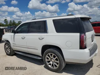 2015 GMC Yukon Denali with VIN 1GKS1CKJ3FR579085, listed as a Copart auction lot 67657084 with 98,456 mi miles and Salvage Title. Bid and sale history available at carsss.com. Image 2.