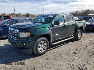 2015 GMC Canyon 2WD SLE with VIN 1GTG5BEA9F1139608, listed as a Copart auction lot 88911415 with 135,942 mi miles and Salvage Title. Bid and sale history available at carsss.com. Image 1.
