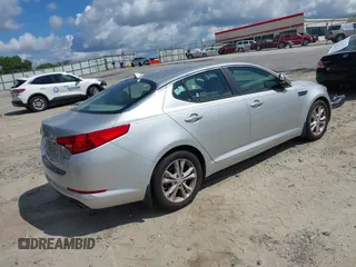 2013 Kia Optima EX with VIN 5XXGN4A7XDG120413, listed as a IAAI auction lot 42756581 with 174,242 mi miles and . Bid and sale history available at DreamBid. Image 4.