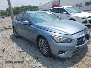 2020 Infiniti Q50 Luxe z VIN JN1EV7AR3LM251219, wystawiony jako IAAI lot #42412336 z przebiegiem 87 658 mil mil oraz . Historia ofert i sprzedaży dostępna na DreamBid. Obrazek 1.