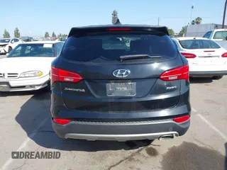 2016 Hyundai Santa Fe z VIN 5XYZT3LB6GG379054, wystawiony jako IAAI lot #42406174 z przebiegiem 182 073 mil mil oraz . Historia ofert i sprzedaży dostępna na DreamBid. Obrazek 16.
