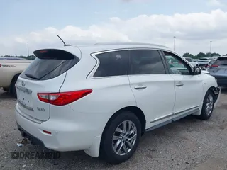 2014 Infiniti QX60 with VIN 5N1AL0MM8EC519291, listed as a IAAI auction lot 39510962 with 109,429 mi miles and . Bid and sale history available at DreamBid. Image 4.
