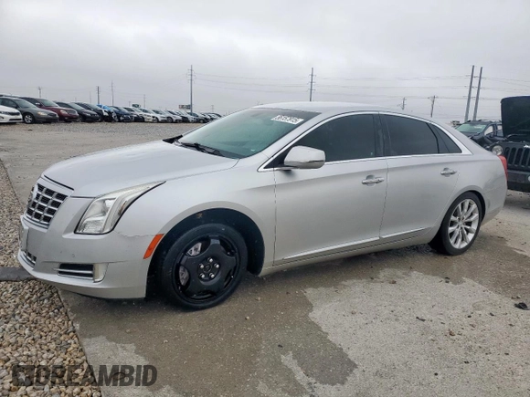 2013 Cadillac XTS Luxury with VIN 2G61P5S38D9199527, listed as a Copart auction lot 56157915 with 90,448 mi miles and Clean title. Bid and sale history available at DreamBid. Image 1.