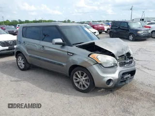 2013 Kia Soul with VIN KNDJT2A5XD7629165, listed as a IAAI auction lot 41931405 with 173,928 mi miles. Bid and sale history available at carsss.com. Image 1.