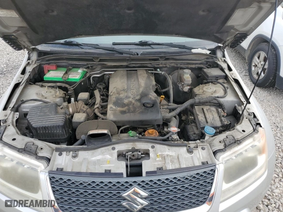2010 Suzuki Grand Vitara Limited with VIN JS3TE0D73A4100112, listed as a Copart auction lot 50907365 with 146,484 mi miles and Salvage Title. Bid and sale history available at carsss.com. Image 12.