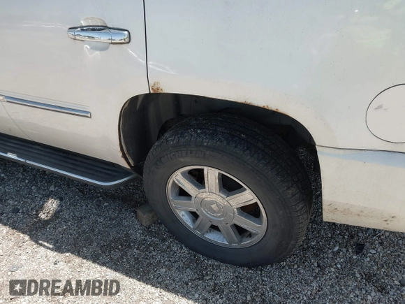 2007 Cadillac Escalade z VIN 1GYFK63827R299936, wystawiony jako IAAI lot #42254274 z przebiegiem 193 798 mil mil oraz . Historia ofert i sprzedaży dostępna na DreamBid. Obrazek 12.