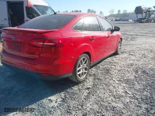 2015 Ford Focus SE with VIN 1FADP3F22FL362299, listed as a IAAI auction lot 41907348 with 127,686 mi miles. Bid and sale history available at carsss.com. Image 4.