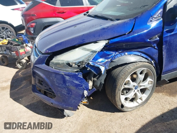 2016 Ford Escape Titanium with VIN 1FMCU0J95GUC41632, listed as a IAAI auction lot 41692040 with 144,834 mi miles. Bid and sale history available at carsss.com. Image 6.