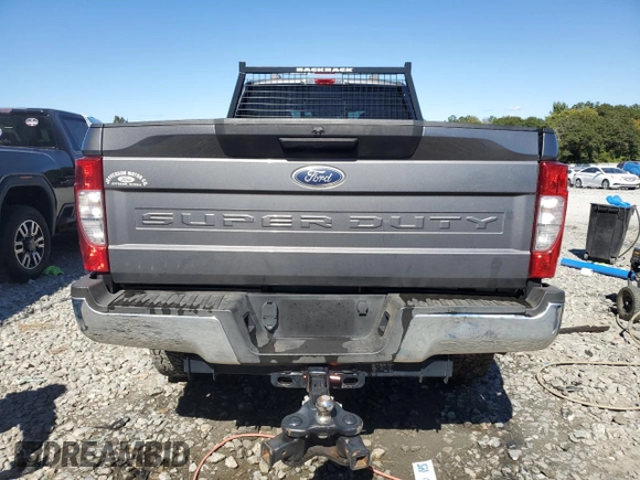 2021 Ford Super Duty F-250 SRW XL with VIN 1FT7X2B6XMEC80607, listed as a Copart auction lot 76134304 with 57,912 mi miles and Salvage Title. Bid and sale history available at carsss.com. Image 6.