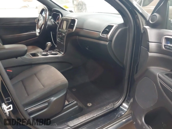 2021 Jeep Grand Cherokee Laredo X with VIN 1C4RJFAG5MC817567, listed as a IAAI auction lot 42297526 with 71,387 mi miles and . Bid and sale history available at DreamBid. Image 5.