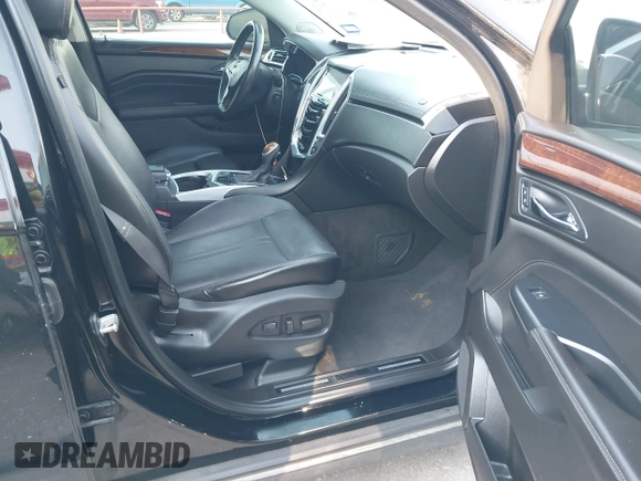 2013 Cadillac SRX Luxury Collection z VIN 3GYFNCE31DS648973, wystawiony jako IAAI lot #42208689 z przebiegiem 176 115 mil mil oraz . Historia ofert i sprzedaży dostępna na DreamBid. Obrazek 5.
