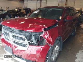 2013 Dodge Durango SXT with VIN 1C4RDJAG4DC527945, listed as a IAAI auction lot 41590545 with 141,074 mi miles and . Bid and sale history available at DreamBid. Image 19.