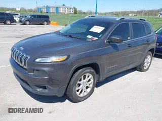 2014 Jeep Cherokee Latitude with VIN 1C4PJMCS2EW137767, listed as a IAAI auction lot 42052071 with 165,300 mi miles and . Bid and sale history available at DreamBid. Image 17.