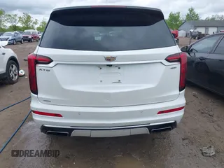2021 Cadillac XT6 Premium Luxury z VIN 1GYKPDRS0MZ141453, wystawiony jako IAAI lot #42215954 z przebiegiem 144 245 mil mil oraz . Historia ofert i sprzedaży dostępna na DreamBid. Obrazek 17.