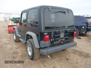 2006 Jeep Wrangler Sport with VIN 1J4FA49S66P746787, listed as a IAAI auction lot 41537730 with 97,365 mi miles. Bid and sale history available at carsss.com. Image 3.