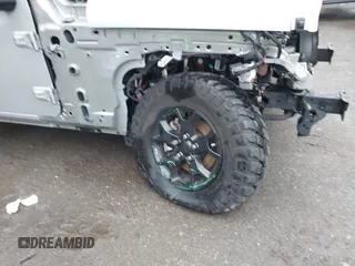 2022 Jeep Wrangler Unlimited Willys Sport with VIN 1C4HJXDM9NW272685, listed as a IAAI auction lot 41948921 with Not provided miles and . Bid and sale history available at DreamBid. Image 6.
