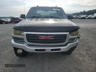 2004 GMC Sierra 1500 SLT z VIN 2GTEK13TX41346384, wystawiony jako Copart lot #72956314 z przebiegiem Nie podano mil oraz Szkoda całkowita • Salvage title. Historia ofert i sprzedaży dostępna na DreamBid. Obrazek 5.