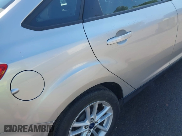 2016 Ford Focus SE with VIN 1FADP3F24GL230601, listed as a IAAI auction lot 41988130 with 176,366 mi miles. Bid and sale history available at carsss.com. Image 13.