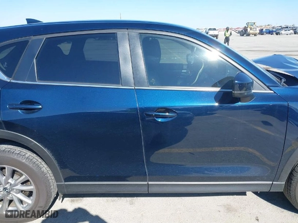 2023 Mazda CX-5 2.5 S Select Package with VIN JM3KFBBM7P0148375, listed as a IAAI auction lot 41624696 with 56,754 mi miles. Bid and sale history available at carsss.com. Image 13.