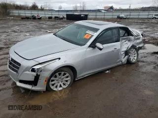 2014 Cadillac CTS Luxury AWD with VIN 1G6AX5SX0E0144200, listed as a Copart auction lot 48211245 with 126,610 mi miles and Non Repairable. Bid and sale history available at DreamBid. Image 1.