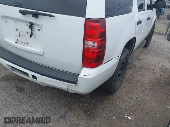 2012 Chevrolet Tahoe Commercial with VIN 1GNLC2E02CR322901, listed as a IAAI auction lot 42679887 with 251,794 mi miles and . Bid and sale history available at DreamBid. Image 6.