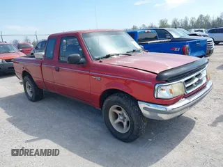1997 Ford Ranger XLT with VIN 1FTCR14X9VPA31147, listed as a IAAI auction lot 42059636 with 211,883 mi miles. Bid and sale history available at carsss.com. Image 1.