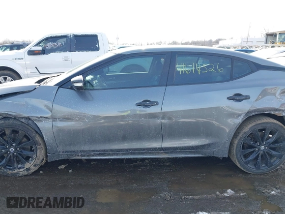 2018 Nissan Maxima SV with VIN 1N4AA6AP4JC372351, listed as a IAAI auction lot 41614526 with 70,237 mi miles and . Bid and sale history available at DreamBid. Image 14.