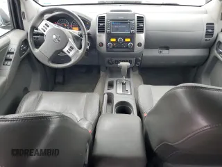 2014 Nissan Frontier SL z VIN 1N6AD0FV2EN720242, wystawiony jako Copart lot #86976214 z przebiegiem 118 581 mil mil oraz Szkoda całkowita • Salvage title. Historia ofert i sprzedaży dostępna na DreamBid. Obrazek 8.