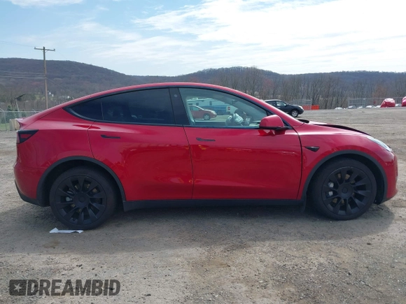 2021 Tesla Model Y Long Range with VIN 5YJYGDEE0MF209191, listed as a IAAI auction lot 41937507 with 56,131 mi miles. Bid and sale history available at carsss.com. Image 12.