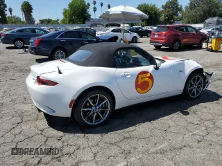 2021 Mazda MX-5 Miata Grand Touring with VIN JM1NDAD77M0459510, listed as a Copart auction lot 68654874 with 39,657 mi miles and Salvage title. Bid and sale history available at DreamBid. Image 3.